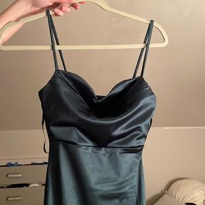 this a prom dress, the color is emerald green, and it is size xs small